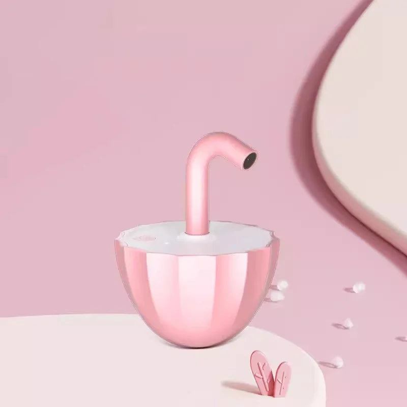 A pink automatic laser cat toy with a white base, featuring a flexible tube with a laser pointer at the top, set against a two-tone pastel background.