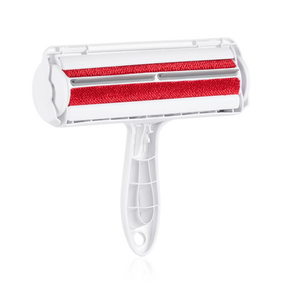 White pet hair remover with red rubber pad on a white background