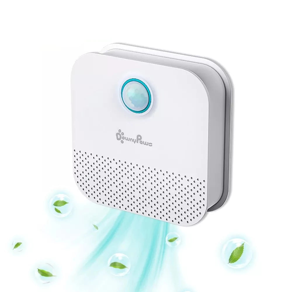 A white FelineFresh AirPurrifier with a blue light ring on the top, emitting a stream of air with a few leaves illustrating its air purifying feature.