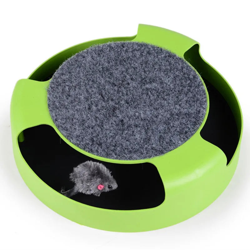 A green and gray interactive triple disc cat toy with a spinning disc and a small toy mouse inside.