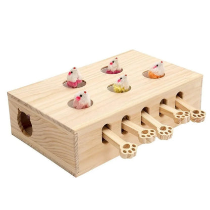 A wooden cat toy with holes for mice and logs for cats to play with.