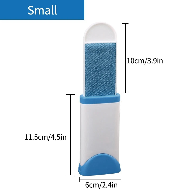 A lint roller with a white handle and a grey roller head, shown being used to remove lint and fur from a person's sweater. There are additional rollers with different colored attachments displayed beside it.