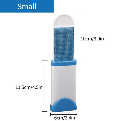 A lint roller with a white handle and a grey roller head, shown being used to remove lint and fur from a person's sweater. There are additional rollers with different colored attachments displayed beside it.