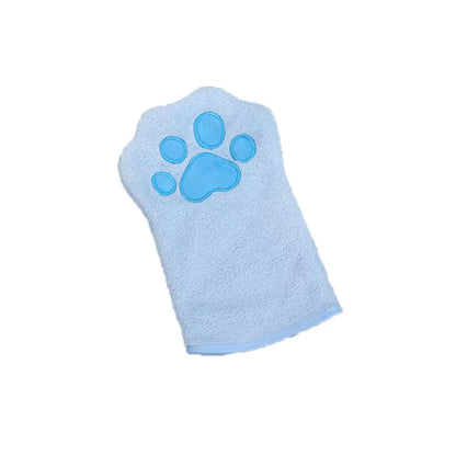 A blue microfiber pet grooming glove with a paw print design on it.