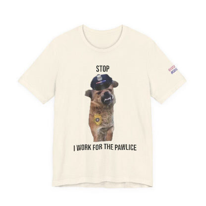 Beige t-shirt with a dog wearing a police hat graphic and text on a white background
