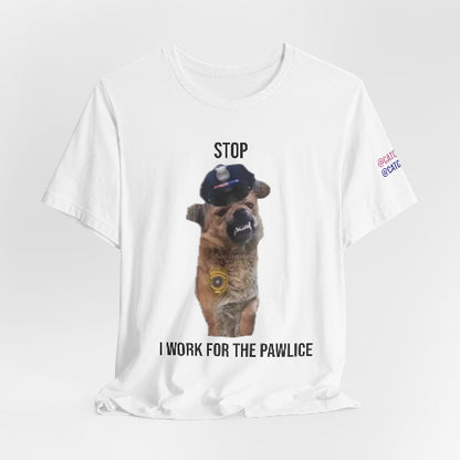 White t-shirt with a graphic of a dog wearing a police hat and sunglasses, with text 'Stop I work for the pawlice' on a white background.