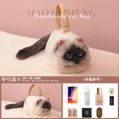 A plush cat-shaped one-shoulder bag in white and gray colors with blue eyes, displayed in different sizes and being used to carry various items such as a phone and cosmetics.