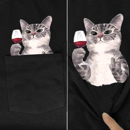 Black t-shirt with a graphic of a cat holding a glass of red wine, one side showing the design on a plain background and the other side showing the design on a black t-shirt.