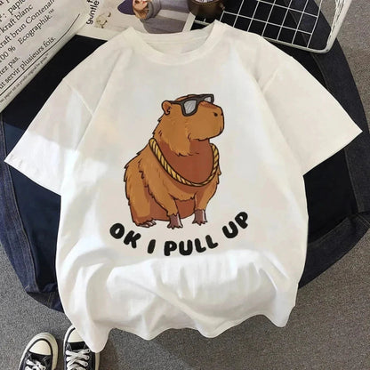 White t-shirt with a cartoon groundhog design and text 'OK I PULL UP' on a casual setting.