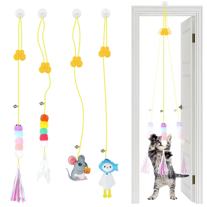 A cat playing with a Springy Cat Bouncer Toy hanging from the ceiling.