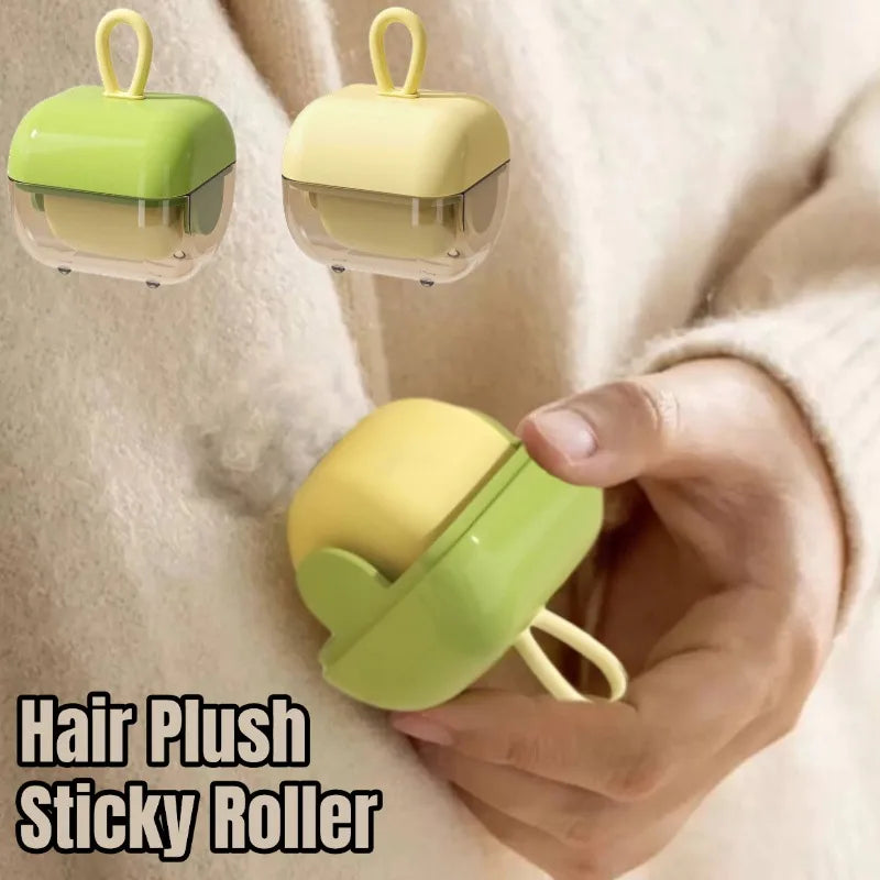 A hand holding a green and yellow washable pet hair and lint remover with sticky roller technology.